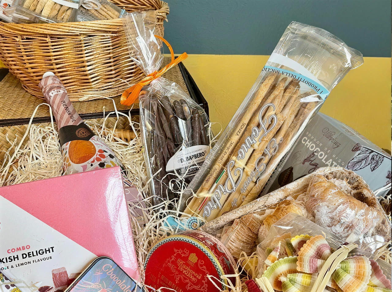 A wicker hamper packed with deli treats
